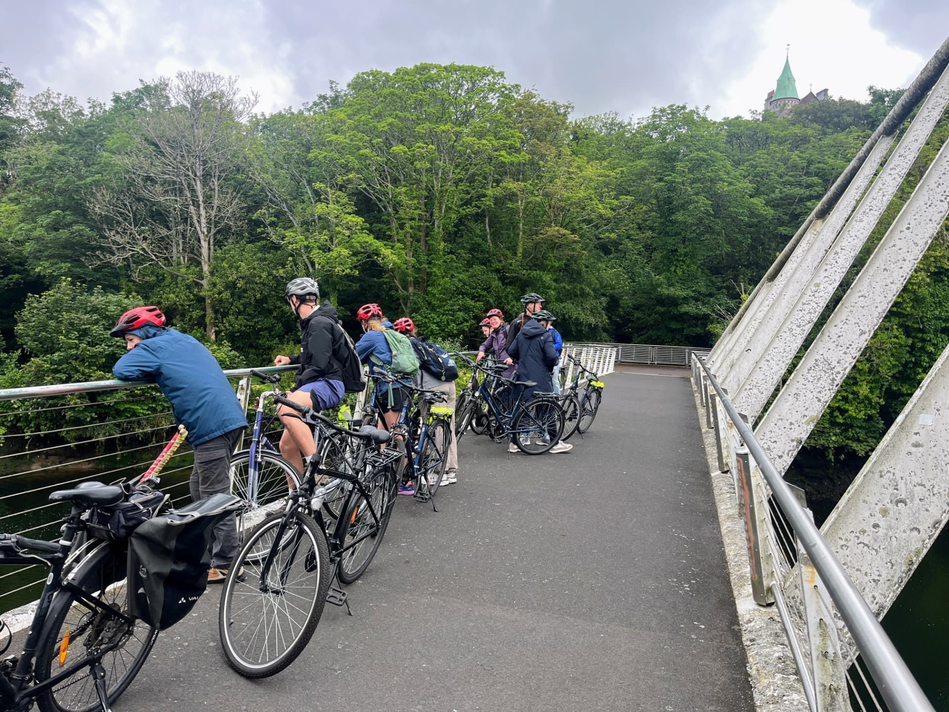 Cyclists enjoying a guided ride beside the River Lee in Cork