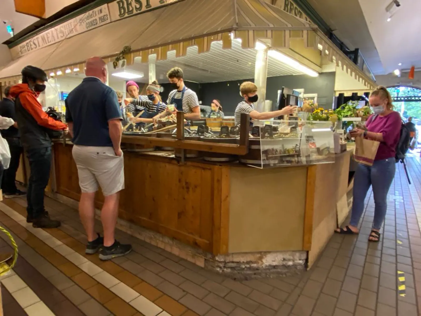 Stalls and shoppers inside the English Market in Cork city centre