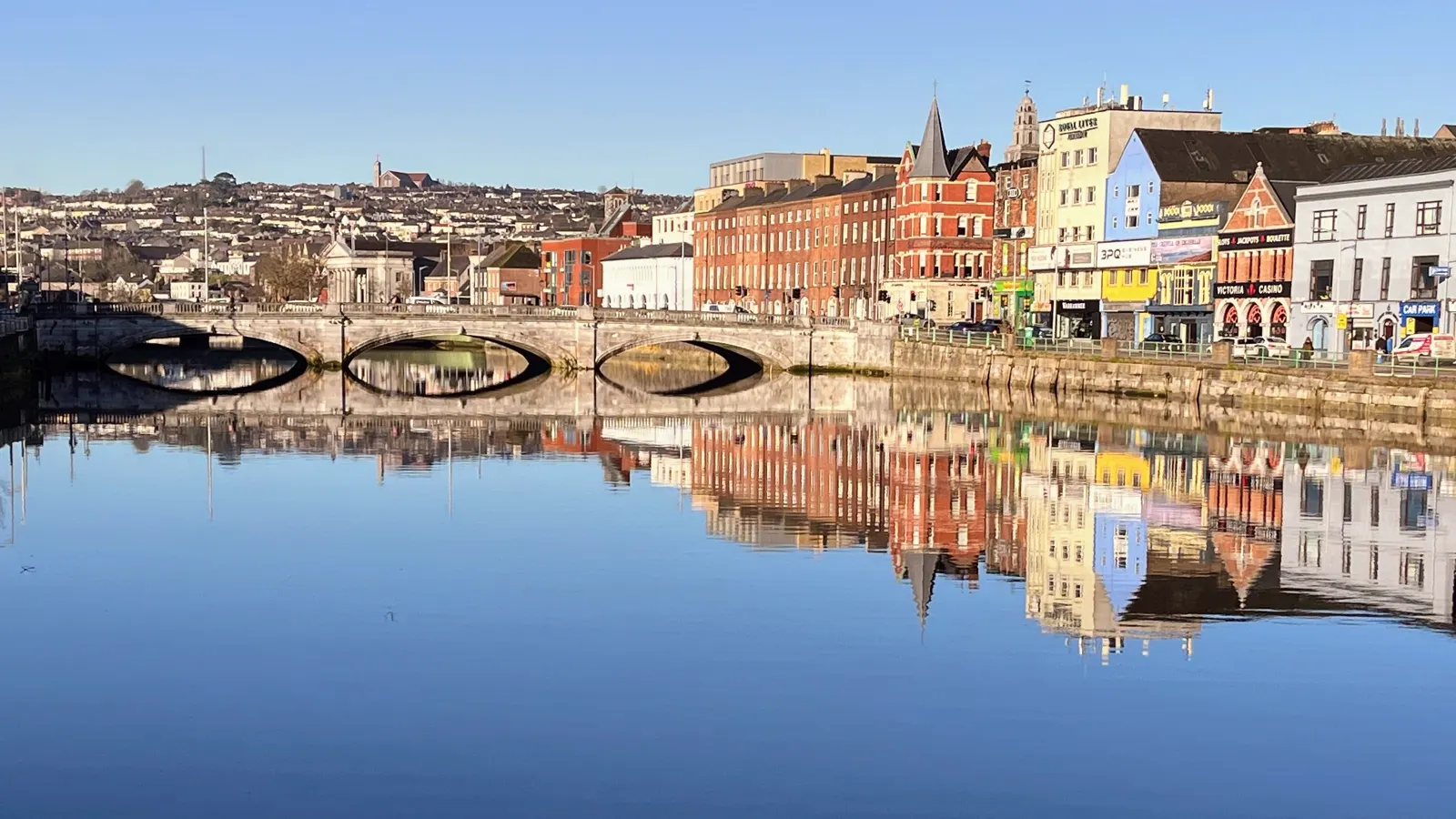 Saint Patrick's Bridge and Patrick's Quay reflected in the River Lee in Cork city